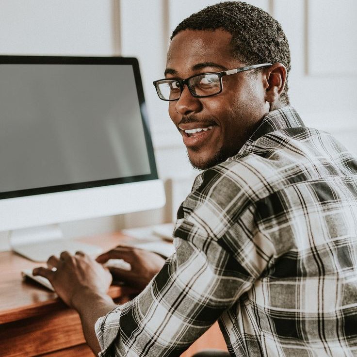 black man typing on a keyboard premium image by…